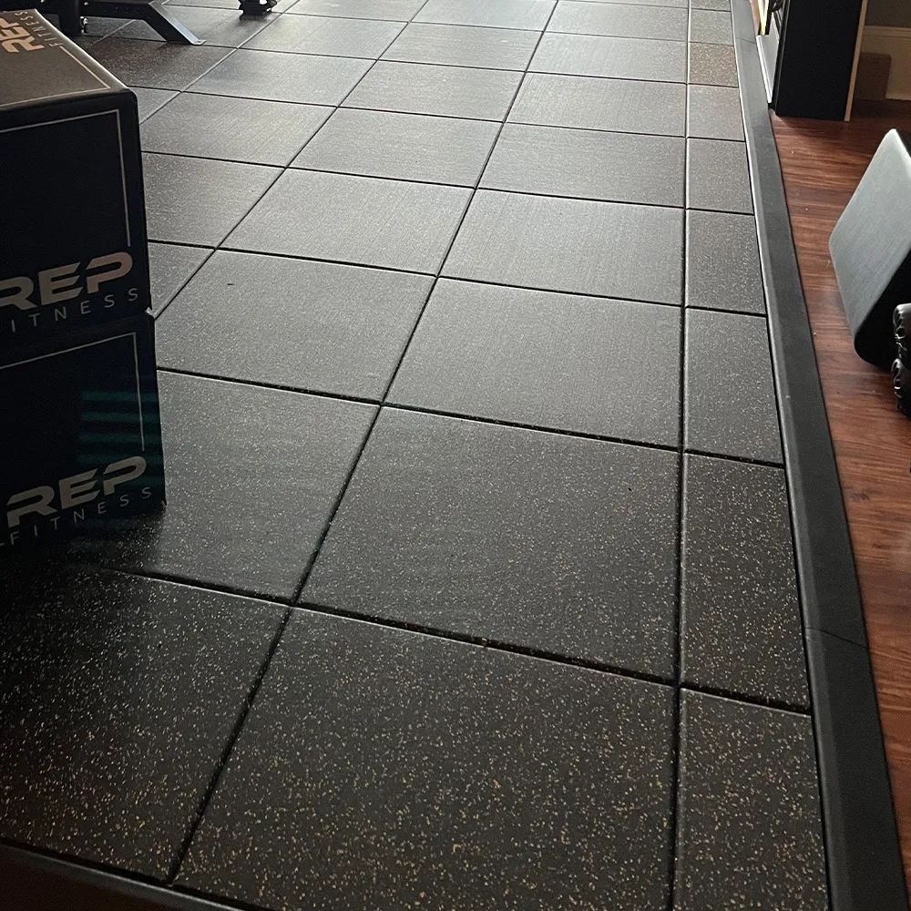 rubber tiles over hardwood for home gyms