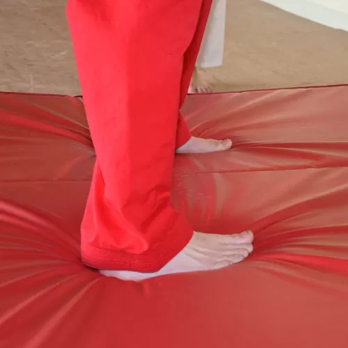 Safety Gymnastic Mats Bi-Fold 5x10 ft x 4 inch feet on mat.