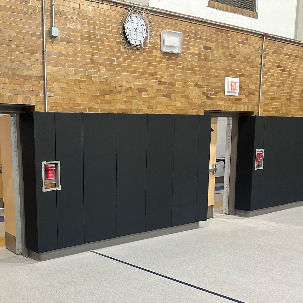 Safety CourtQuiet Impact Wall Pad 2 Inch x 4x6 Ft. Lip TB Night Sky installed in school gym
