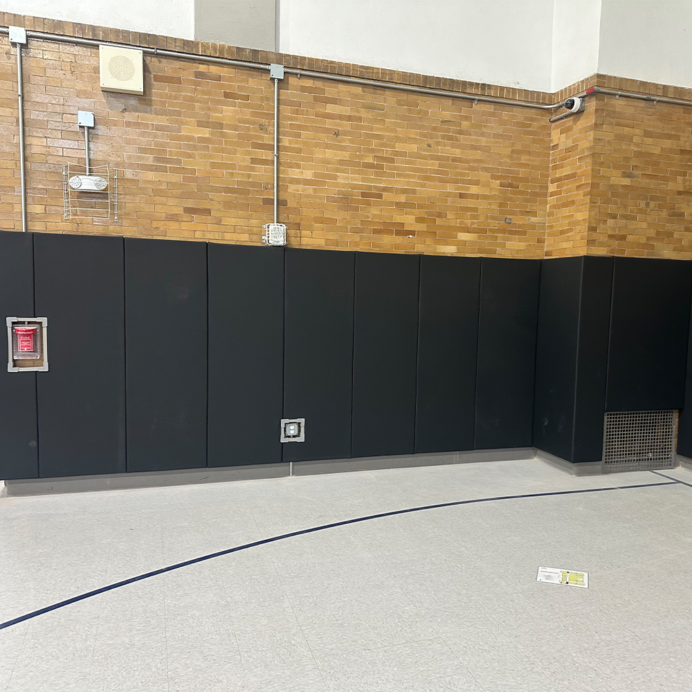 School gym with Safety CourtQuiet Impact Wall Pad 2 Inch x 3x6 Ft. Lip TB in Night Sky