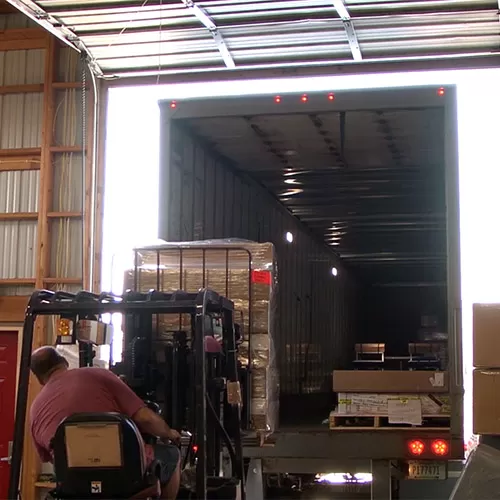 freight being loaded with a forklift