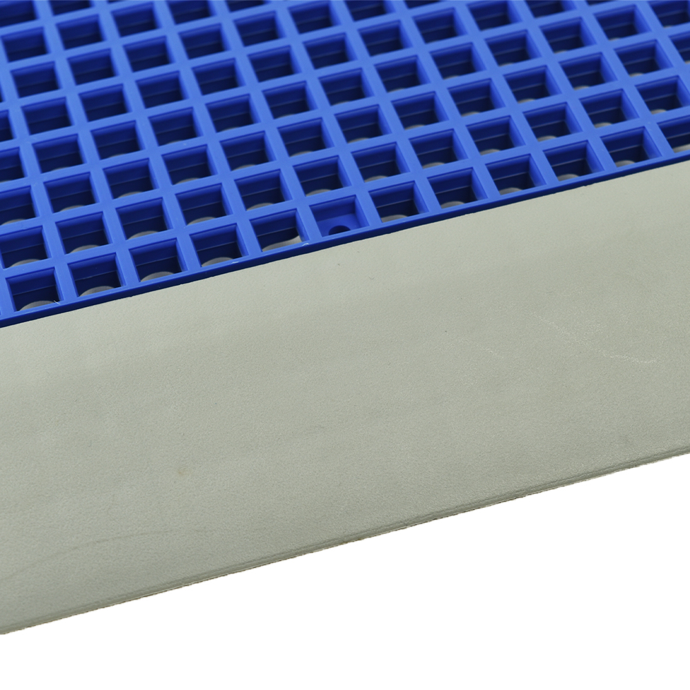 Close of blue tile snaped onto DunkStar BaseCourt Outdoor Corner Edge Borders Gray 5/8 In x 2 Inches Wide