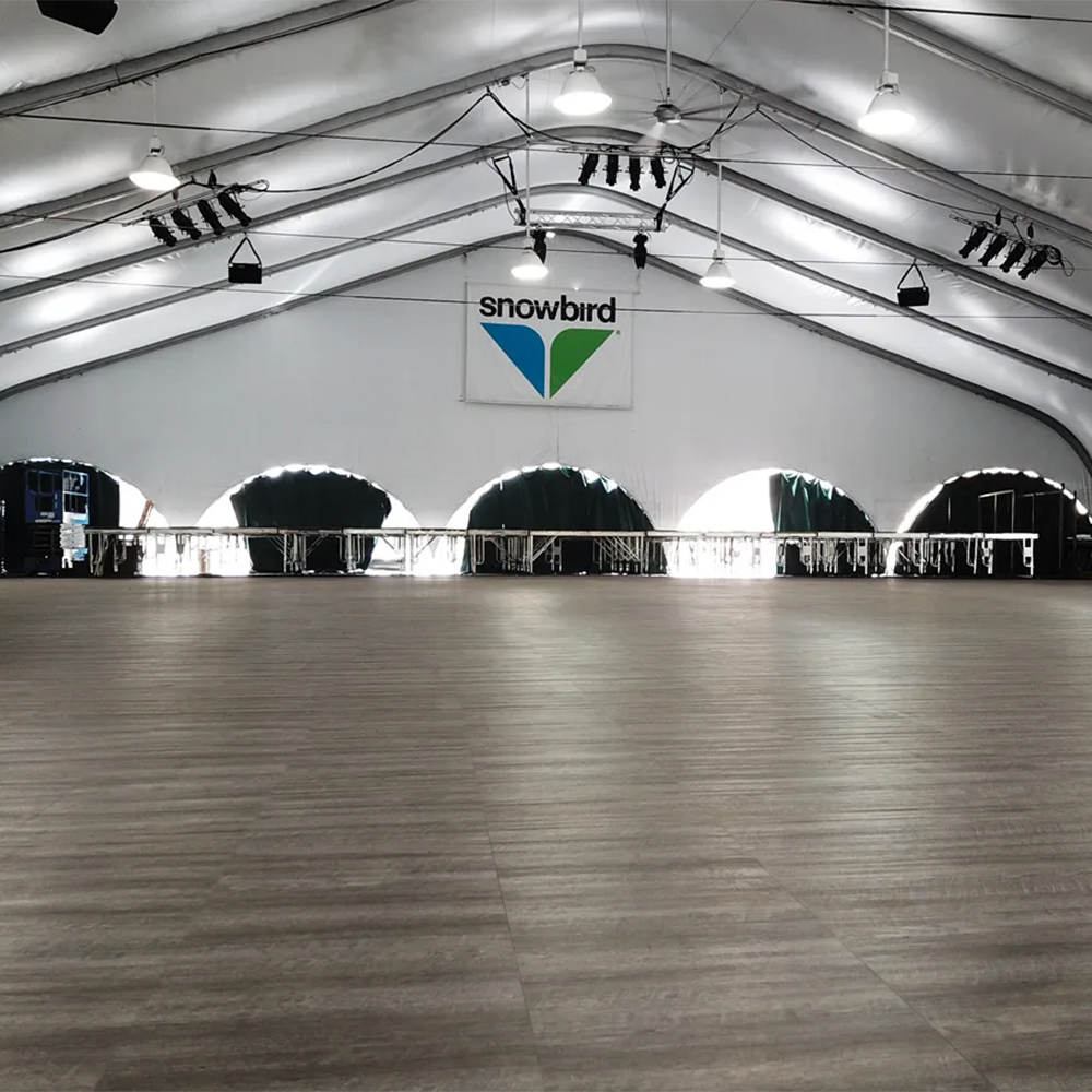 Large tent install of SnapLock Dance Floor Plus Premium Tiles 1/2 Inch x 3x3 Ft. in Smoked Oak