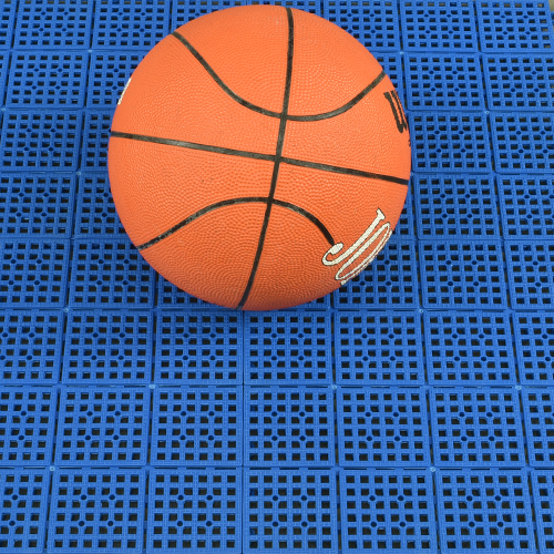 outdoor basketball court tiles over concrete