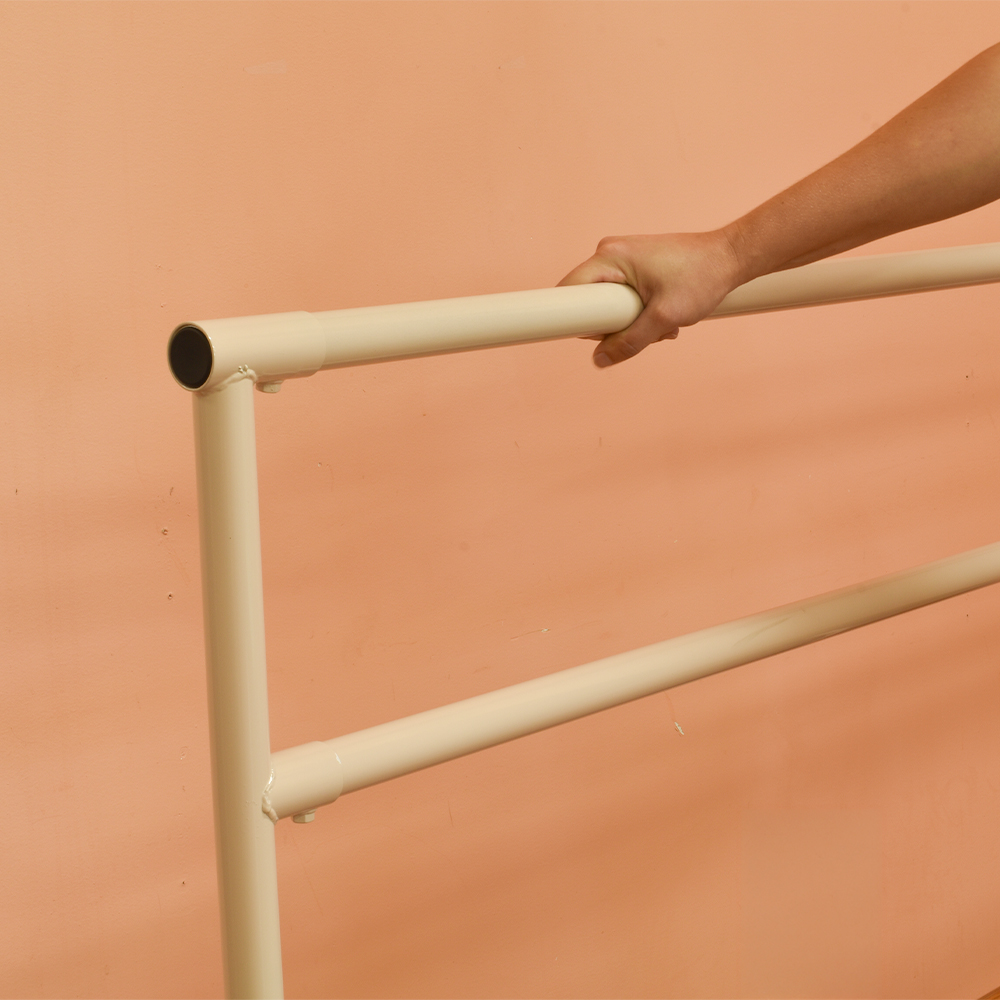 Portable Ballet Dance Barre 6 Ft. persons hand on barre