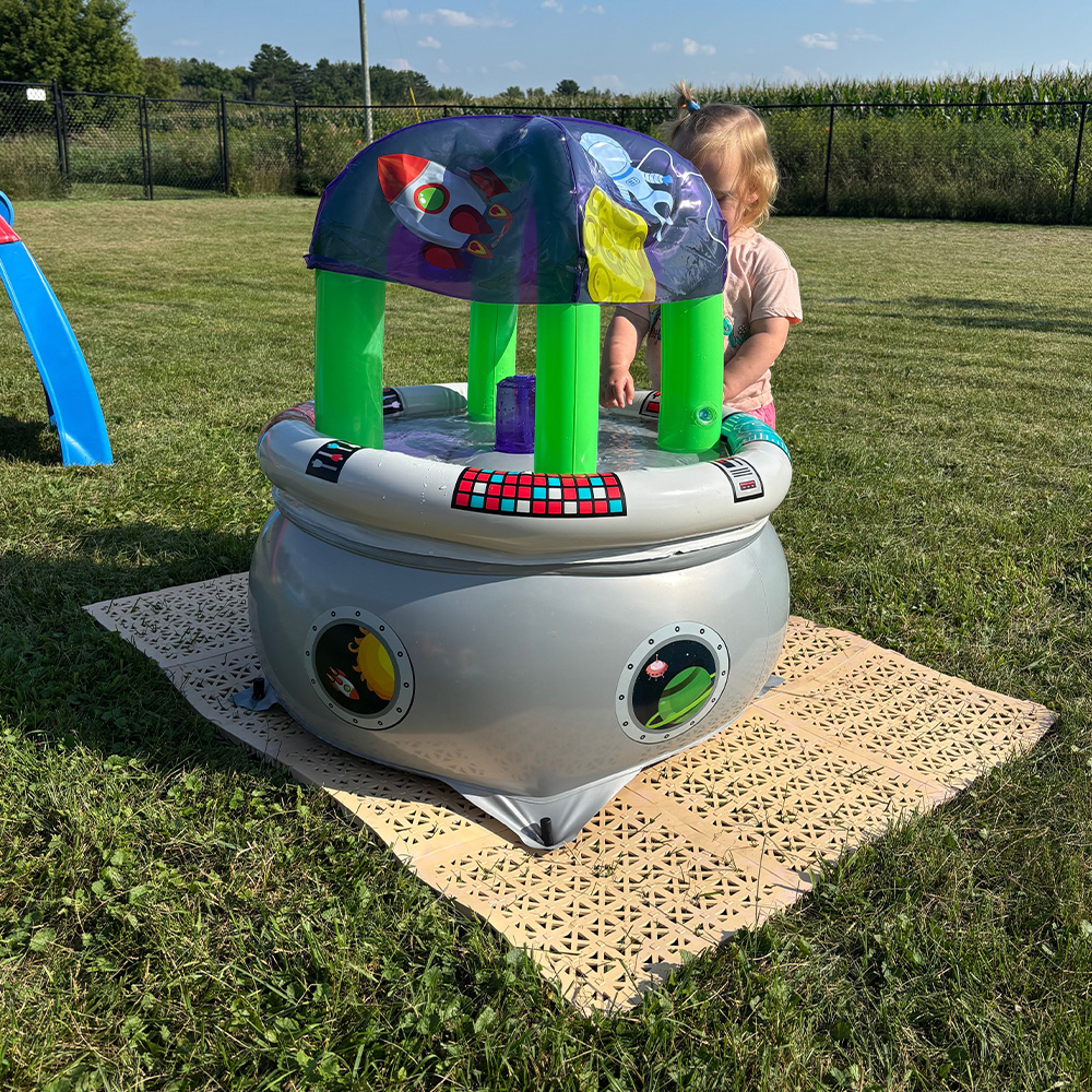 home water play area flooring over grass