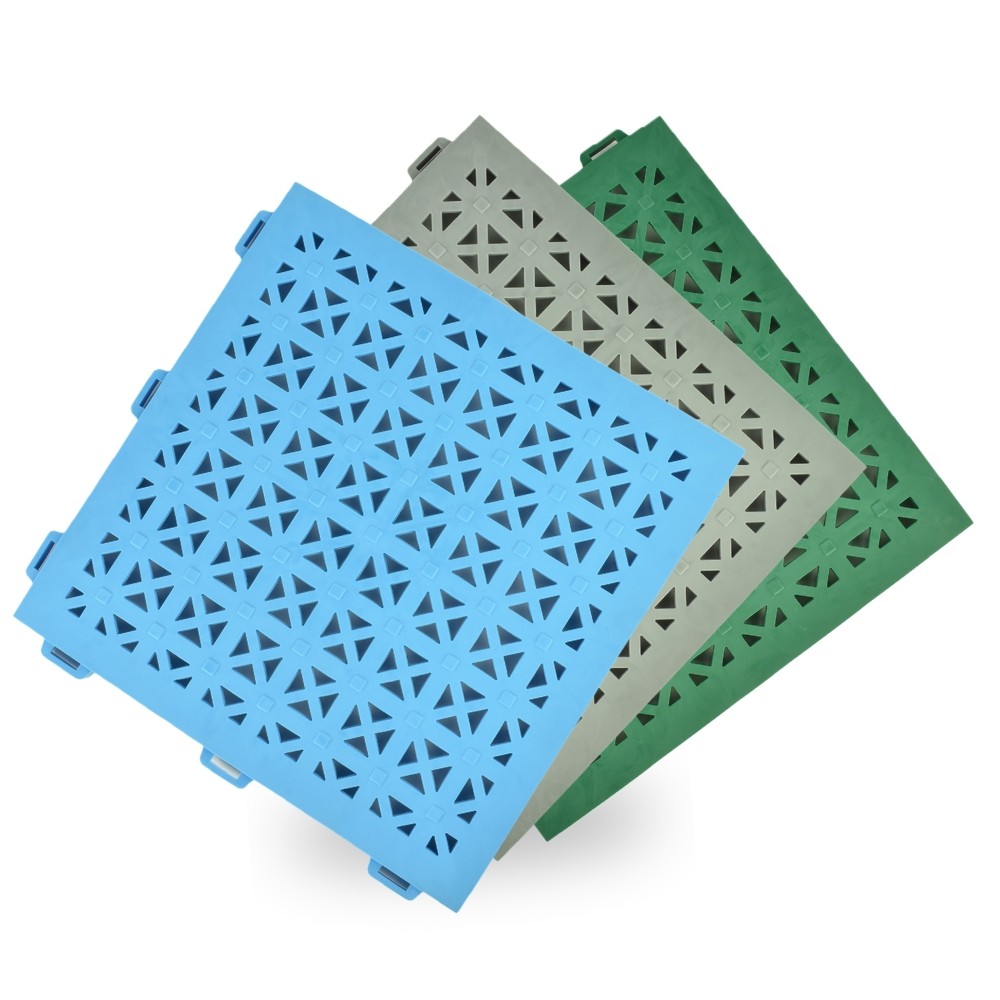 stack of Staylock Perforated Outdoor Deck tiles