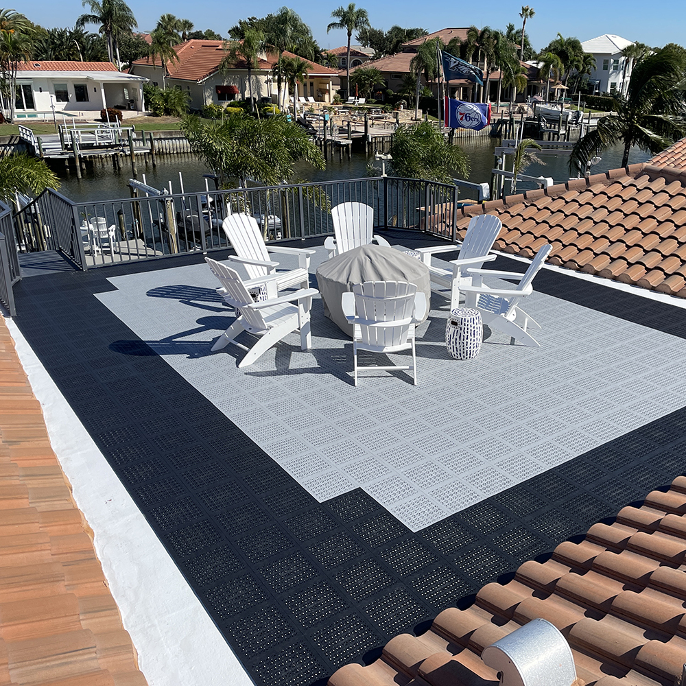 rooftop patio with chairs using staylock outdoor tiles