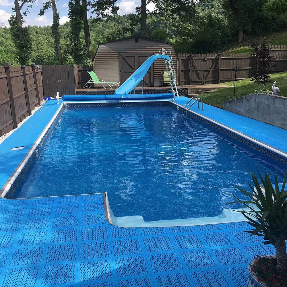blue pvc flexible tiles around outdoor pool