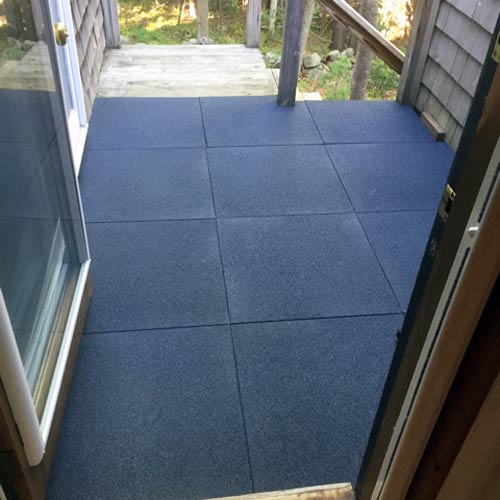 Rubber patio pavers used on wood deck surface