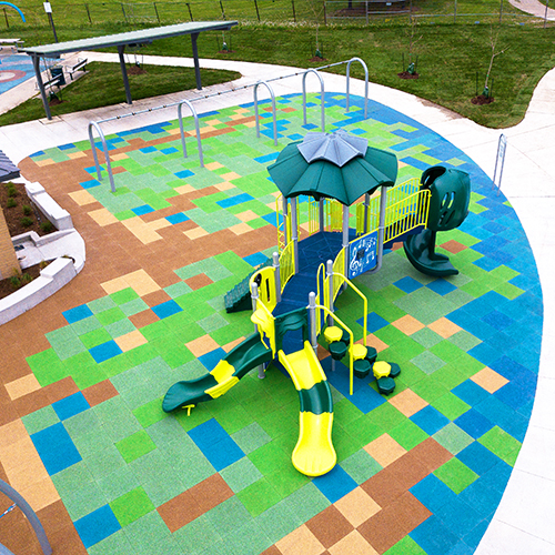 colorful rubber playground tiles in an outdoor playground