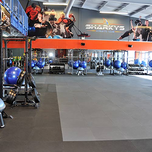 Black and gray sterling rubber tiles installed in fitness center