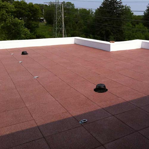 Sterling Rubber Patio Tile 2 Inch red roof after install.