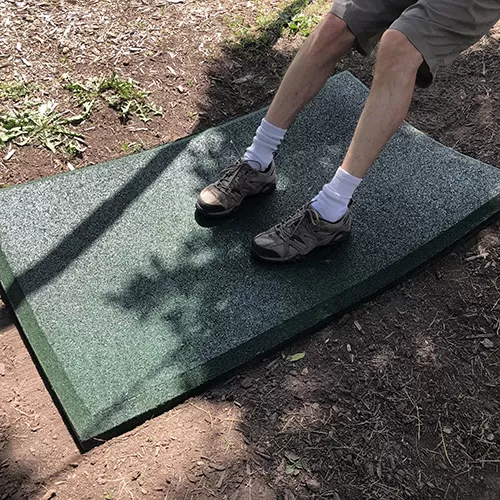 green playground swing mat