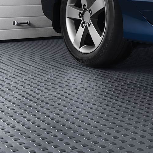 https://www.greatmats.com/images/techfloor-garage-floor/techfloor-garage-floor-tire.jpg