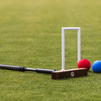 playing croquet on artificial turf