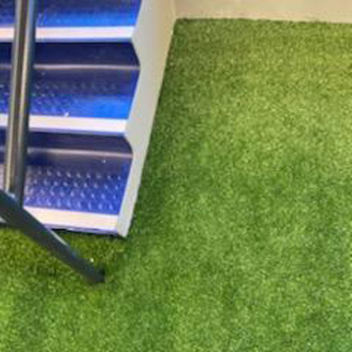 Artificial grass cushioned turf flooring