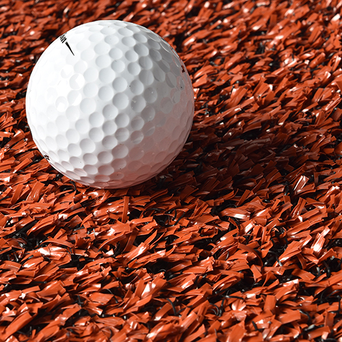 Orange Colored Golf Lesson Turf