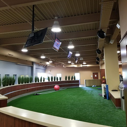 how to maintain large facility artificial indoor turf