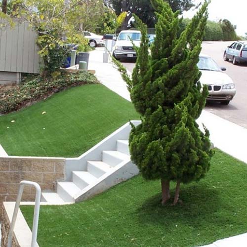 ultimate natural landscaping turf installed on hillside