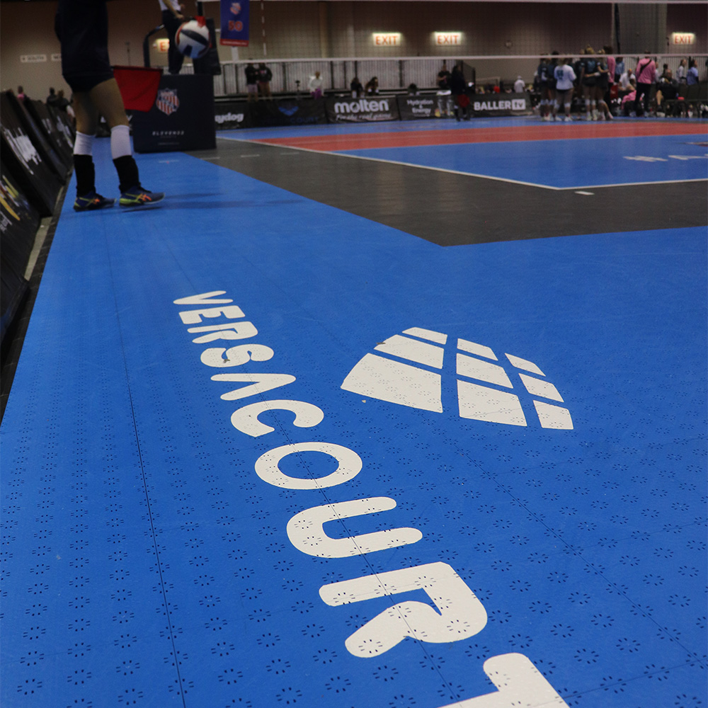 VersaCourt Compete Indoor Court Tile 1/2 Inch x 10x10 Inches royal blue, black, bright red volleyball court