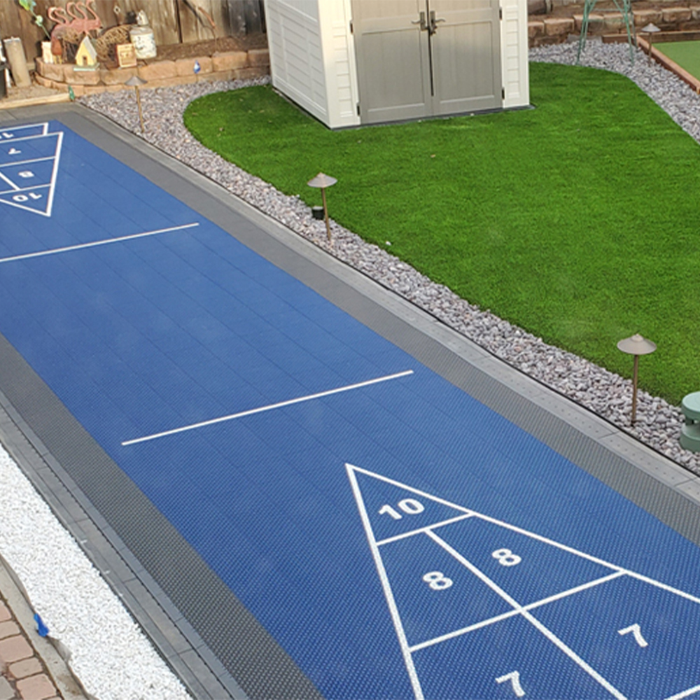 outdoor court foundation panel installed for shuffleboard court with court tiles over the top