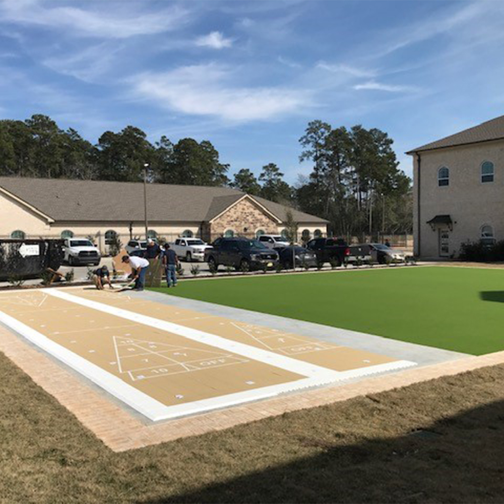 VersaCourt Outdoor Game Court Tile 3/4 Inch installing shuffleboard court in sand