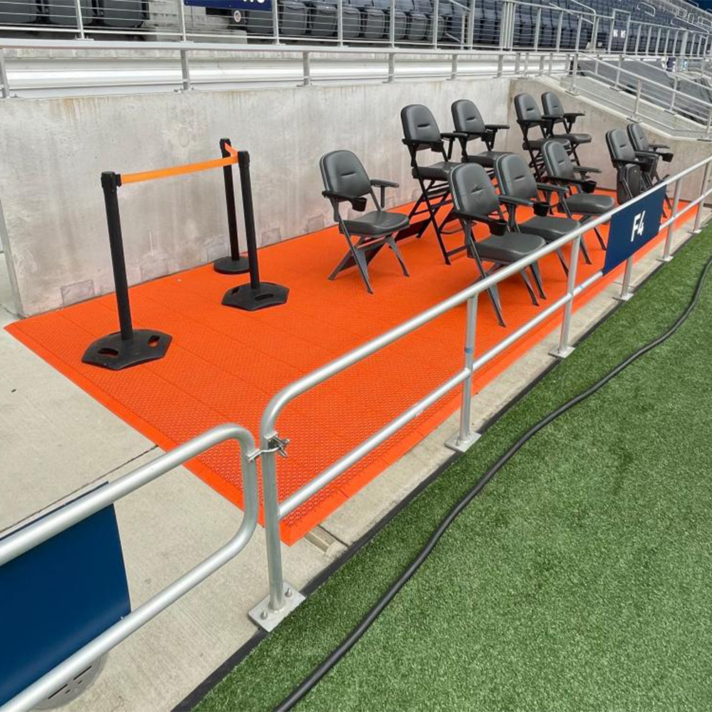 VersaCourt Outdoor Game Court Tile 3/4 Inch orange sideline box seating area