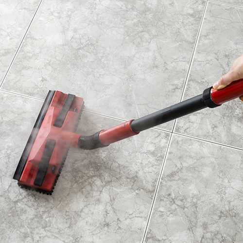 cleaning vinyl flooring with a steam mop