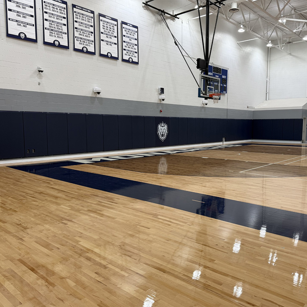 Safety Fire Rated Impact Wall Pad 2 inch x 2x6 Ft. Lip TB  in navy blue around basketball court