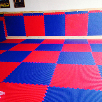 bjj mats on a wall for wrestling 
