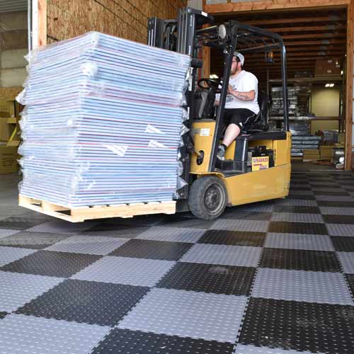 Warehouse Flooring Tiles Under a Forklift