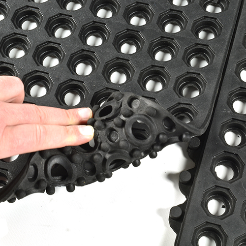 interlocking rubber mats with holes in it