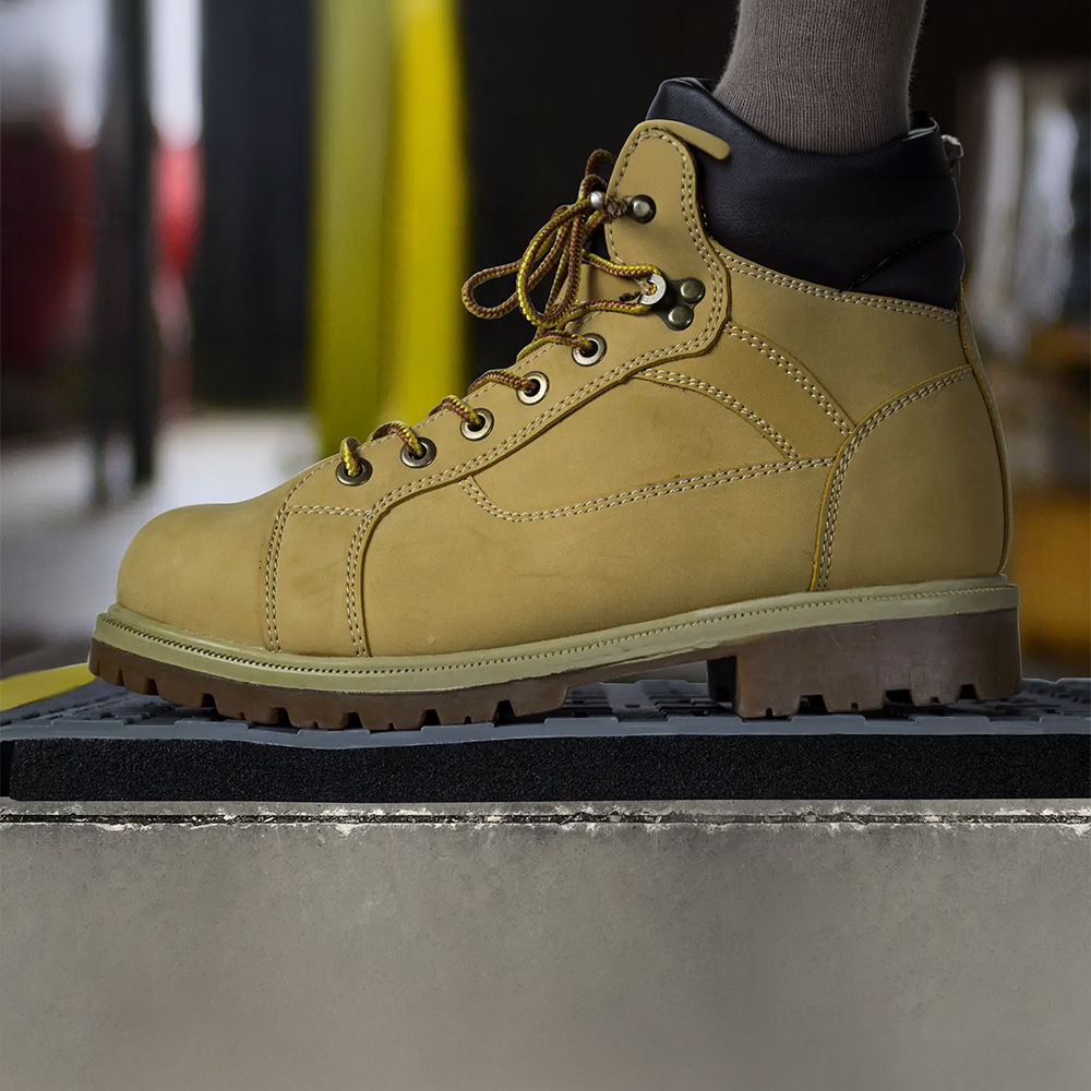 Wearwell ErgoDeck MAX Geometric Tile 7/8 Inch x 18x18 Inches Case of 10 boot on tile