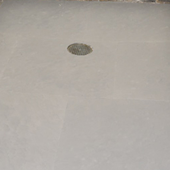 flooring with cutout for floor drain