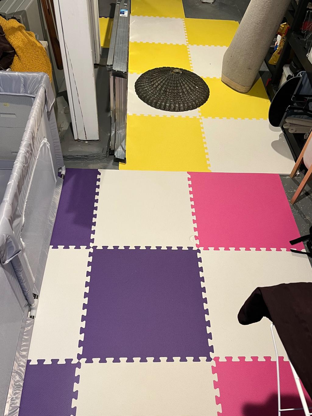 colorful foam mats in basement