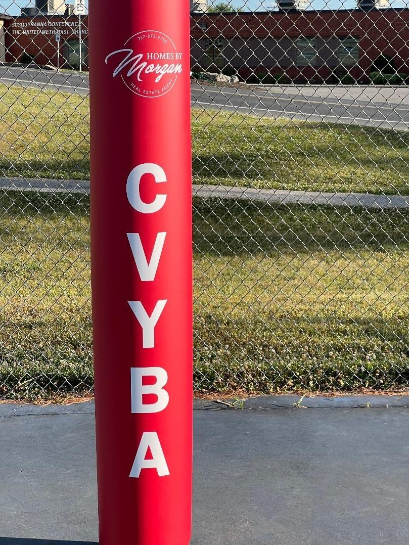 red pole padding with custom graphics for sports