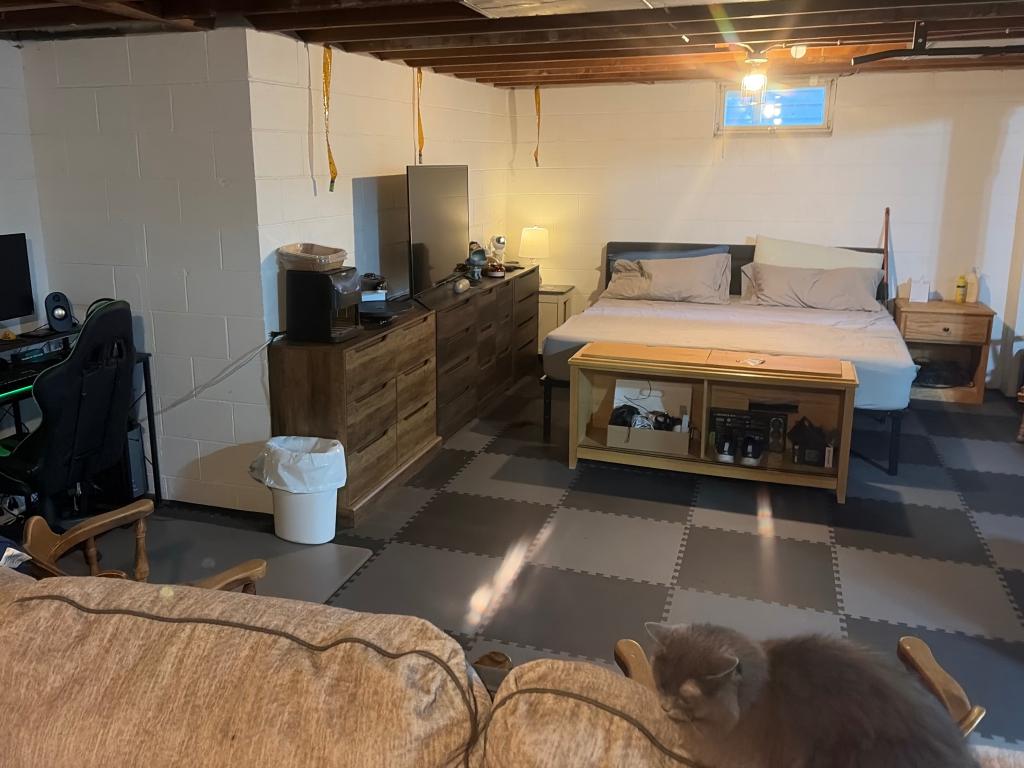 black and gray foam mats in basement