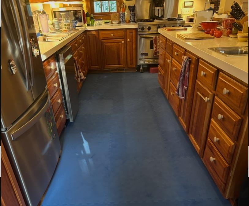 blue foam tiles installed in home kitchen