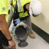 EGrip III Adhesive 4 Gal Pail being poured onto subfloor