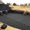 Roof Open Drainage Tile over turf install sand bunker