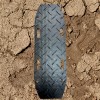 Blue Gator Recovery Traction Diamond Mat Black 1/2 Inch x 1.4x4 Ft. close up with mud