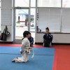Cheerleading Mats 6x42 ft x 1-3/8 Inch Poly Flexible Roll martial arts class on knees.