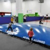 Cheerleading Mat 6x42 ft x 1-3/8 Inch Poly Flexible Roll under jumping bag.