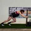 Gym Turf 365 Roll Portable Indoor Sports Turf per SF pushing weights.