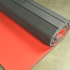 Home Wrestling Flexi-Roll Mat Smooth Surface without Marks 1-1/4 Inch x 10x10 Ft. red mat rolled over concrete