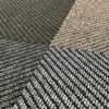 Close up of 4 Dominator LP Carpet Tiles
