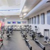 Rolled Rubber Eureka 8 mm 30% Team Colors installed in commercial gym with cardio equipment