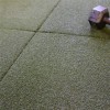 RageTurf UltraTile Interlocking Turf Tiles 24 x 24 Inch x 1 Inch Installed with Dumbbell on Top