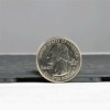 supratile sideview with quarter comparison